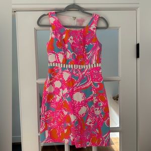 Lilly Pulitzer size 2 pink, orange, blue and white mini dress with cut outs.